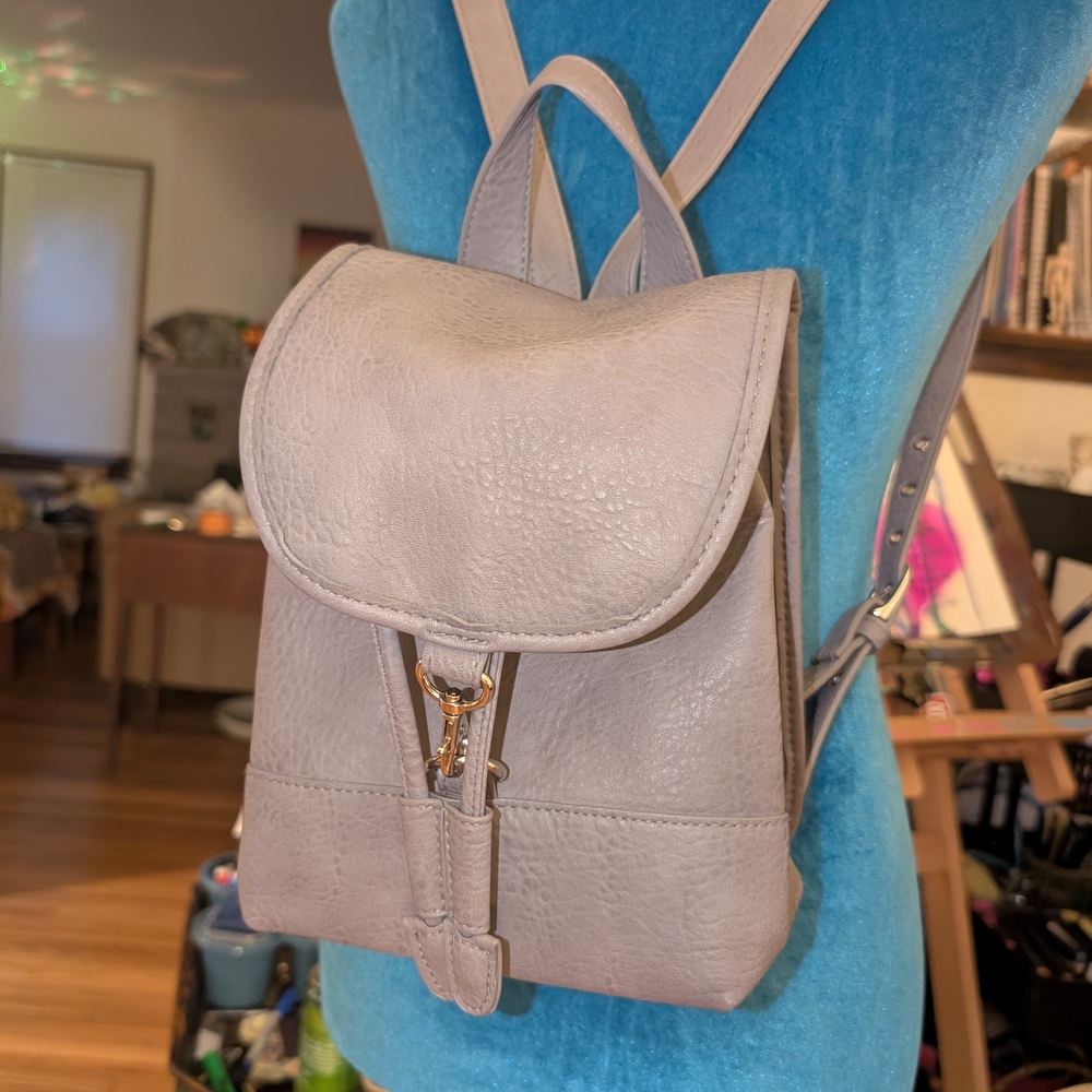 Free People Gray Backpack with Minimalist Design